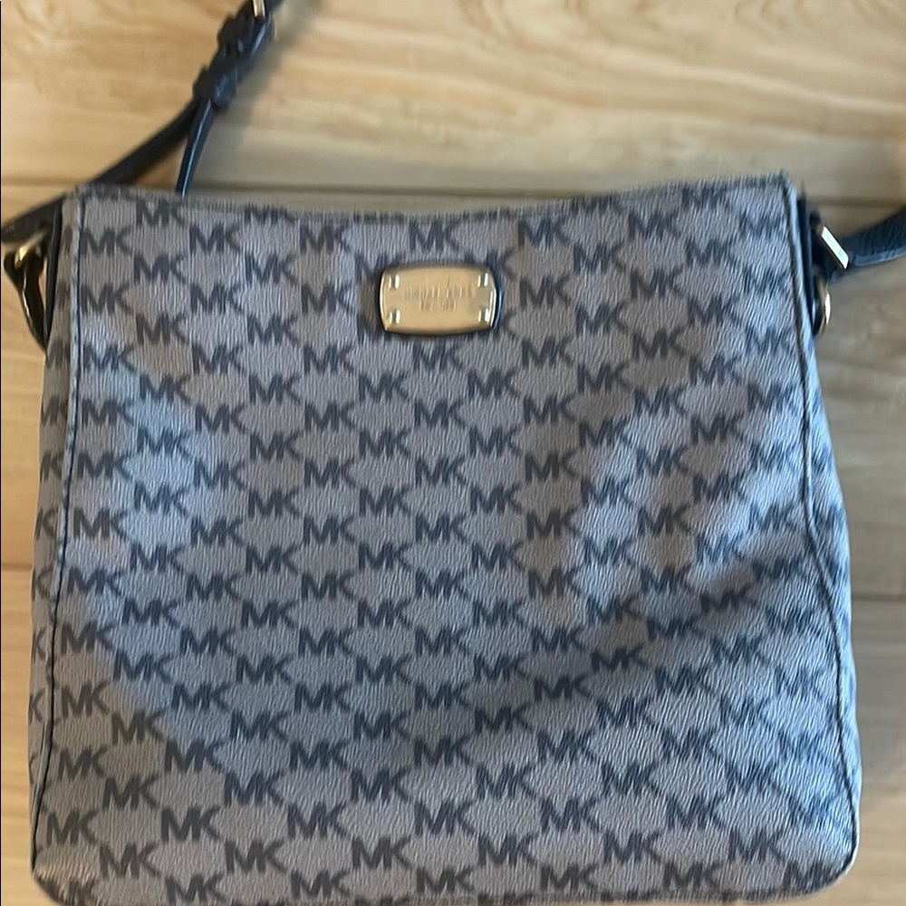 Michael Kors Gray and Black signature crossbody purse.